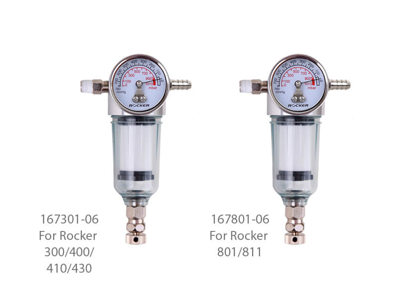 Rocker moisture trap and vacuum regulator